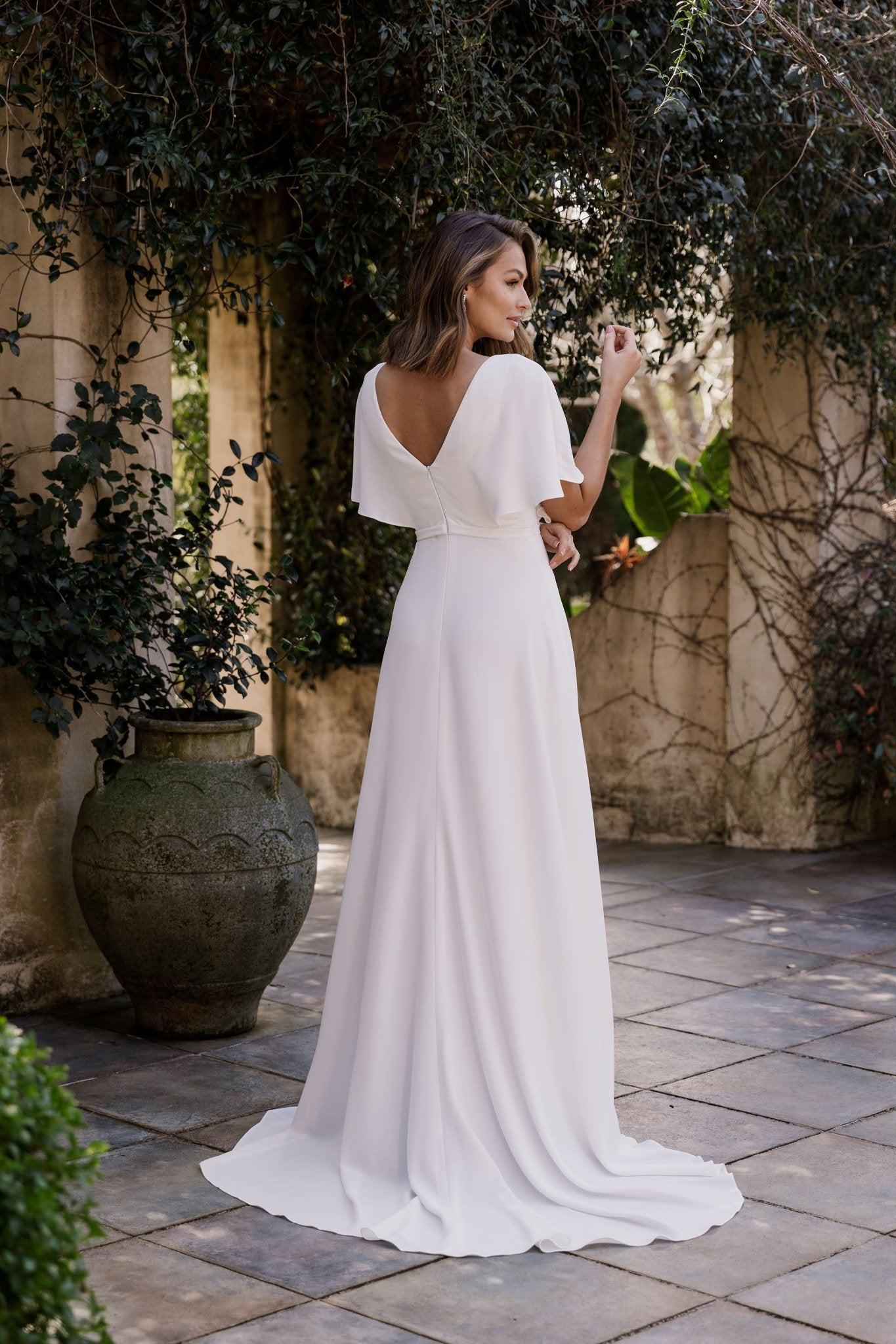 https://www.sentani.com.au/cdn/shop/products/maelle-flutter-sleeve-wedding-dress-tc403-500515.jpg?v=1681524886